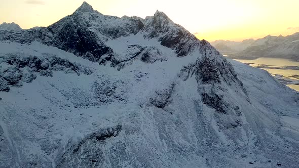 Enormous mountains in somewhere in middle of winter.