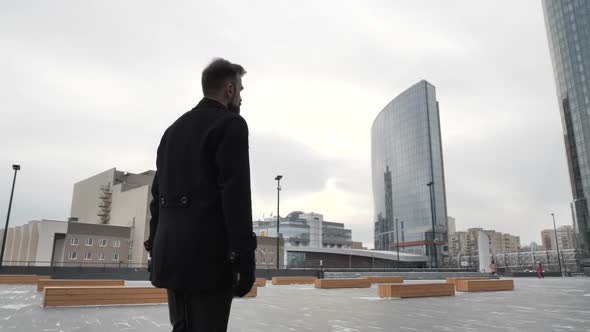 Man Walking Down the Street