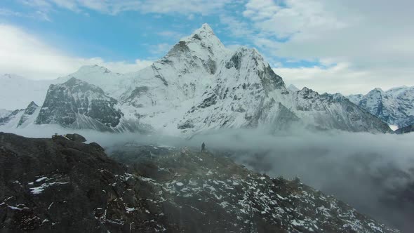 Man Looking on Ama Dablam Mountain. Himalaya, Nepal. Aerial View