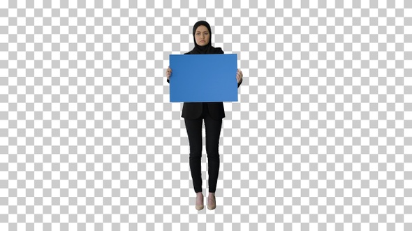 Serious Arab woman in hijab holding blank, Alpha Channel