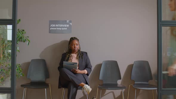 African American Woman Waiting for Job Interview