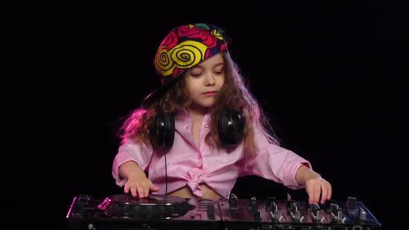 Girl Dj in Bright Cap Playing on Vinyl. Slow Motion