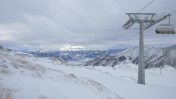Chairlifts riding in the Alps