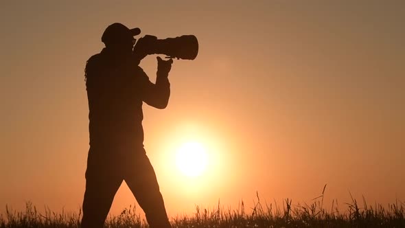 Men Taking Outdoor Pictures During Scenic Sunset. 