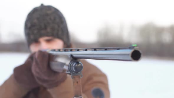 Young Hunter Pointed His Weapon at the Bird.