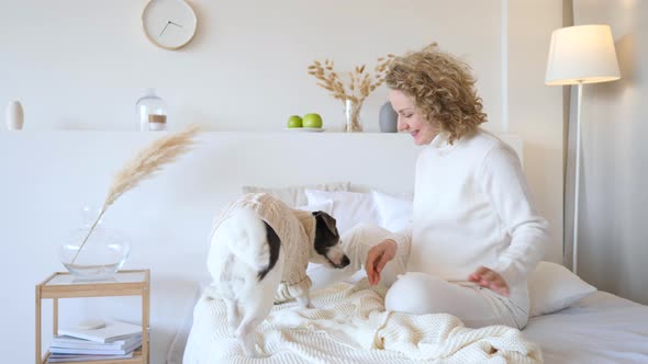 Happy Family And Lifestyle Concept, Woman And Dog In Bed