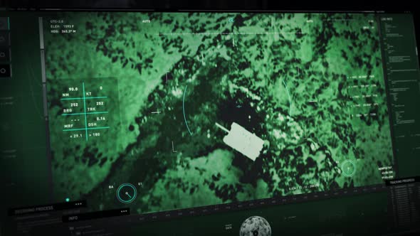Modern Operation Display Uses Night Vision System For Tracking Of Enemy Vehicle alt