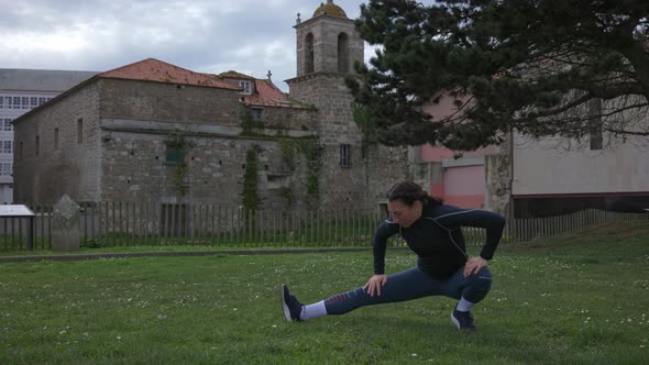 The Athlete Performs Exercises on the Street