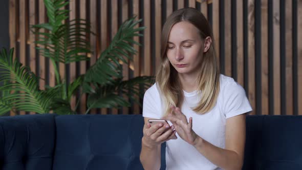 Excited Satisfied Woman Celebrating Success, Online Lottery Win, Looking at Phone Screen, Happy