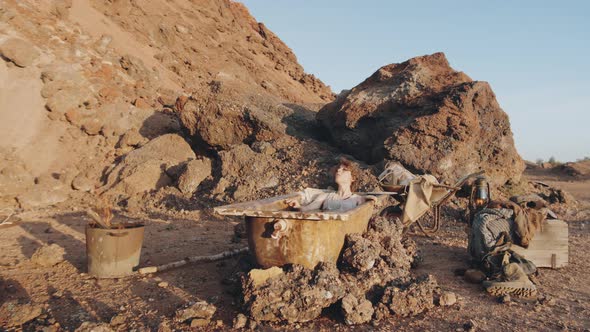 Woman Taking a Bath in Post Apocalyptic World