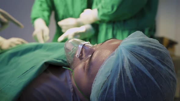 Group of Asian professional doctors medic team surgeons and nurses work in Hospital Operating Room.