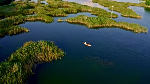 Aerial Video Filming  Beach River, Lake, Body Of Water, Nature, A Boat,  Sup Surfing