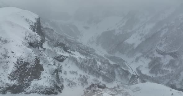 Aerial view of beautiful snowy mountains in Gudauri, Georgia