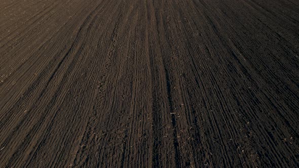 the Drone's Flight Over the Plowed Agricultural Land