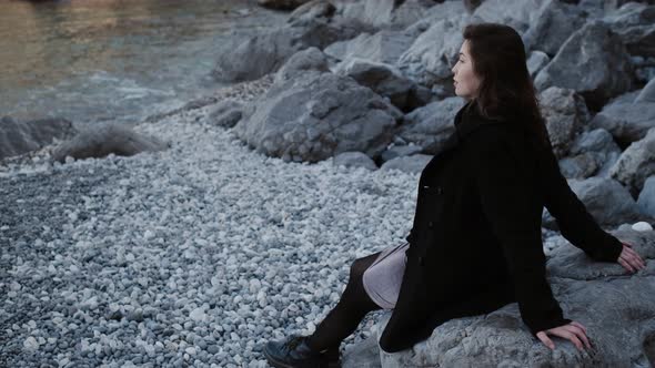 A Beautiful Young Asian Woman on the Seashore