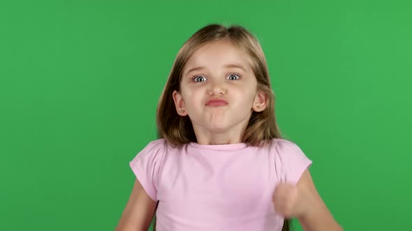 Child Is Angry, She Is Very Nervous. Green Screen