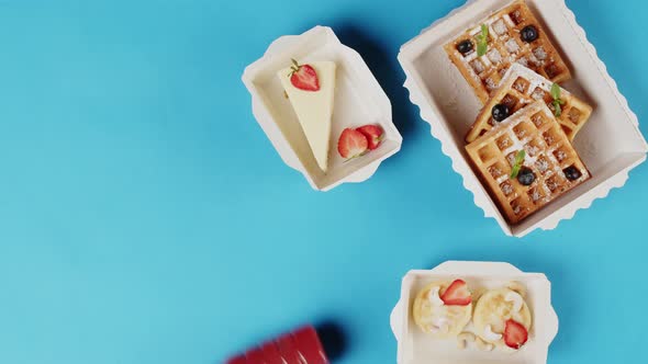 Food Delivery Top View Take Away Breakfast in Disposable Containers on Blue Background