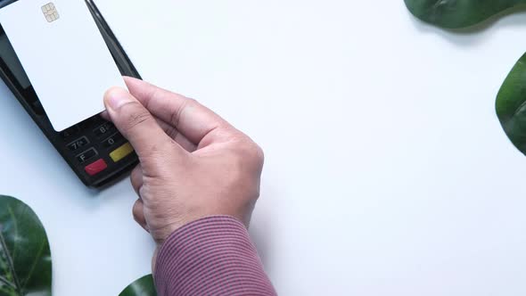 Payment Terminal Charging From a Card, Contactless Payment.