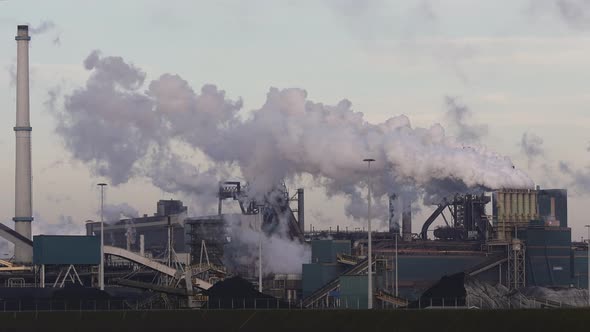 Aerial view of factory Tata Steel with smoking chimneys in Holland