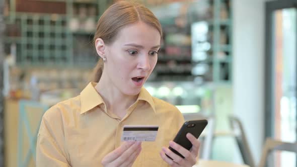 Online Payment Success of Young Woman on Smartphone