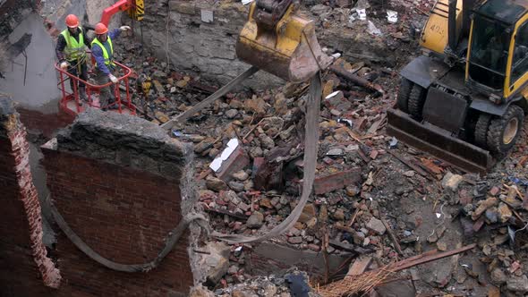 Destruction of Ancient Historical Buildings Excavator Breaks Down an Old Vintage House