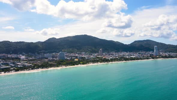 Aerial Beach and cityscape in morning sunlight Patong Phuket Thailand