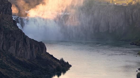 View of Shoshone Falls as the sun lights up the mist in the canyon