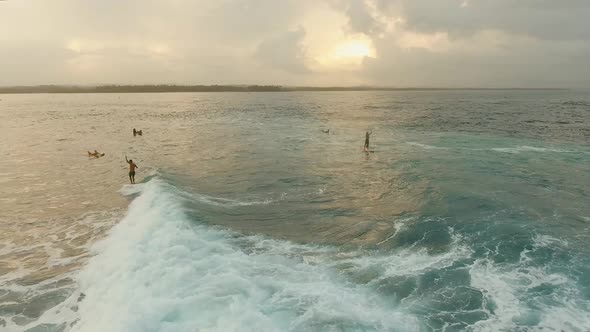 Surfers on the Water Surface