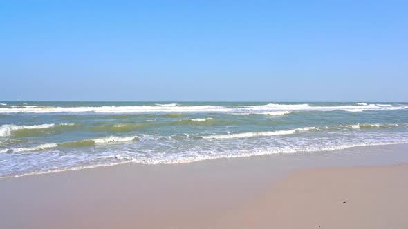 Beautiful tropical beach sea ocean with blue sky and white cloud