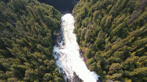 Helmcken Falls powerfully flowing over a cliff on the Murtle River in Wells Gray Provincial Park in