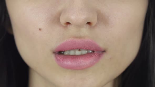 Hot Lips in Teeth, White Background