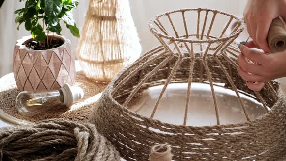 Close Up Woman Makes Handmade Diy Lamp From Jute Rope