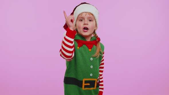 Displeased Child Girl Christmas Elf Gesturing Hands with Displeasure Blaming Scolding for Failure