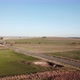 Aerial Take Over A Road And A Passing Car - VideoHive Item for Sale