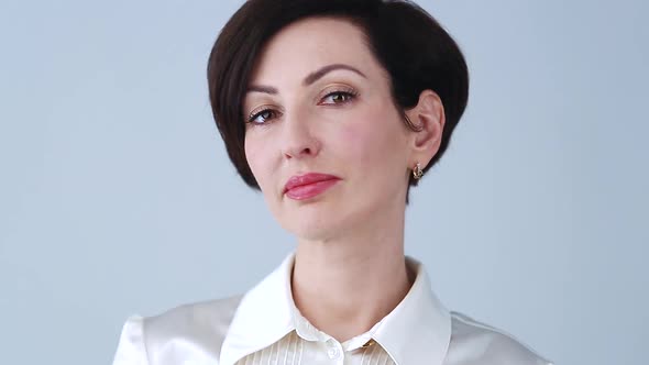 Cheerful business woman smiling with white teeth