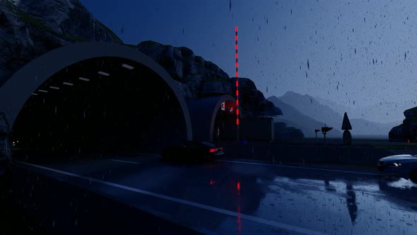 Vehicles Passing Through Tunnel in Rainy Weather