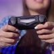 A Young Woman is Playing a Game Console - VideoHive Item for Sale