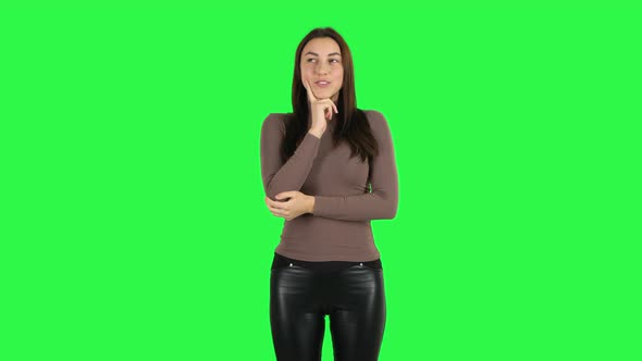 Attractive Girl Waiting in Anticipation with Pleasure. Green Screen