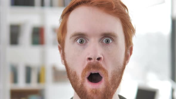 Shocked Face of Casual Redhead Man