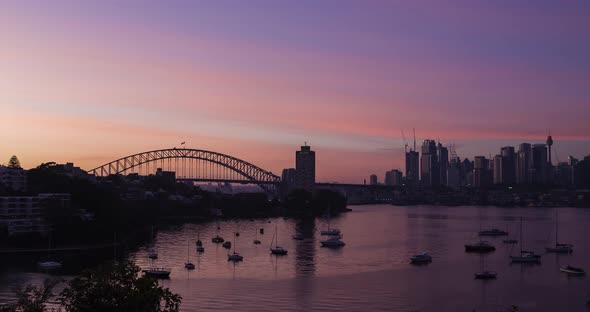 Timelapse of a sunrise over Sydney CBD and Harbour Bridge, Australia