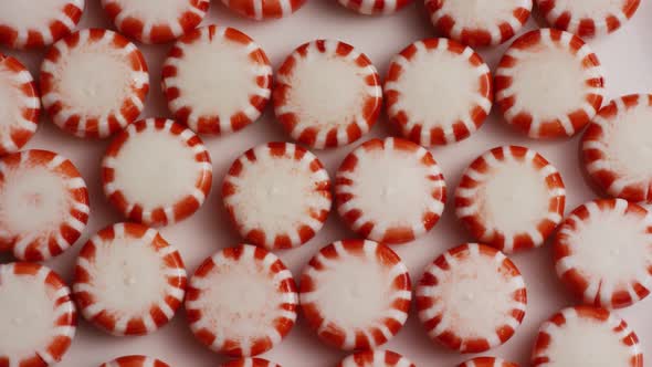 Rotating shot of peppermint candies - CANDY PEPPERMINT 021