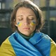 Portrait of a Woman with a Ukrainian Flag on His Shoulders - VideoHive Item for Sale