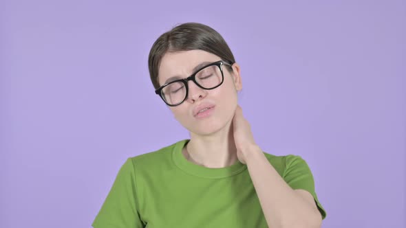 Tired Young Woman Having Neck Pain on Pink Background