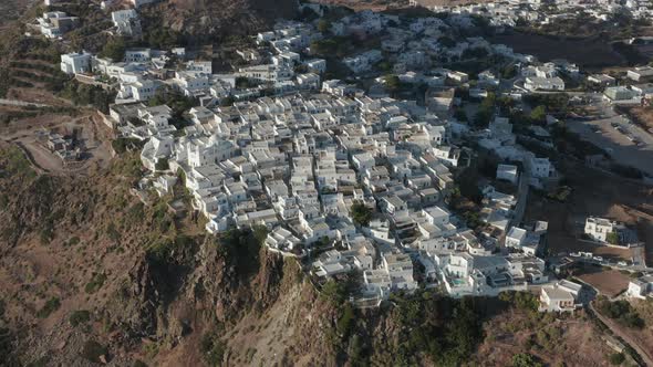 Wide Aerial View of Greek Village with White and Blue Houses