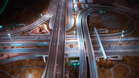 4K : Time lapse Aerial view and top view of traffic on city. Expressway with car lots