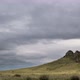Clouds Move Over a Cliff in Overcast Weather - VideoHive Item for Sale