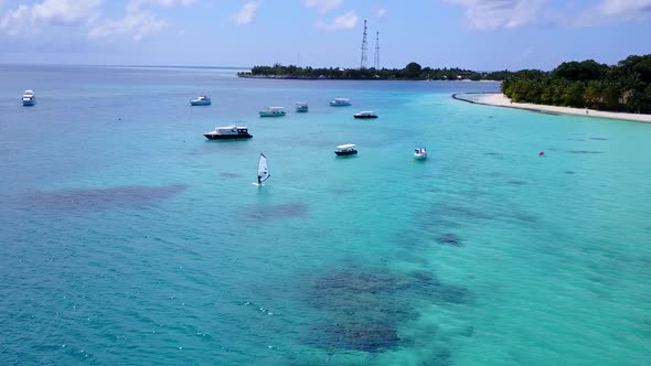 Aerial view scenery of exotic coastline beach voyage by ocean with sand background