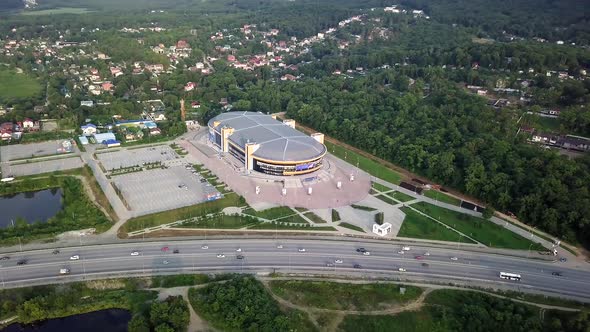 Drone View of the Fetisov Arena Sports Complex Surrounded By Green Hills