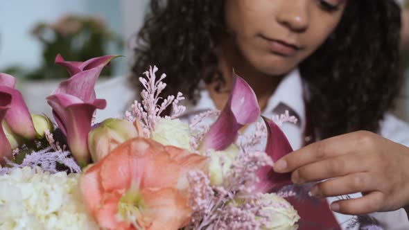 Florist Finishing Flower Composition in Workshop