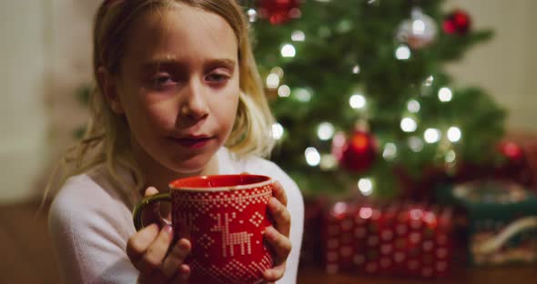 Young girl Enjoying Christmas Cookies